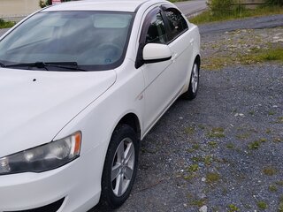 2010 Mitsubishi Lancer X, белый, 650000 рублей, вид 1