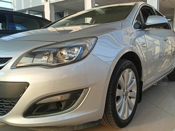 2013 Opel Astra J Рестайлинг, серебристый, 502000 рублей - вид 7