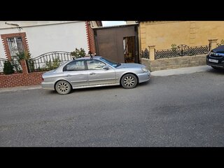 2005 Hyundai Sonata ТагАЗ IV (EF) Рестайлинг, серебристый, 330000 рублей, вид 4