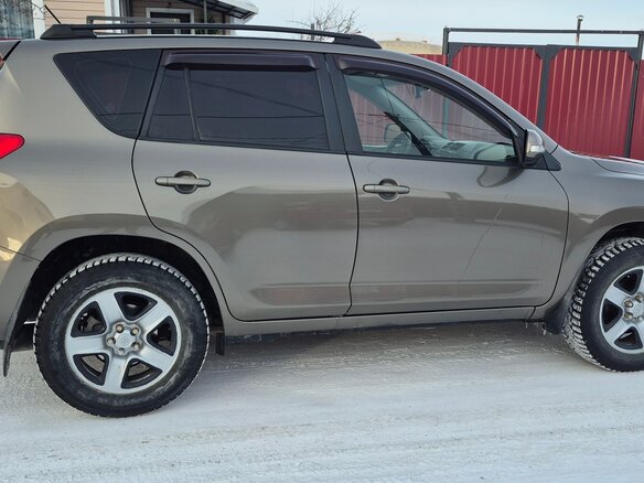 2010 Toyota RAV4 III (XA30) Рестайлинг, коричневый - вид 1