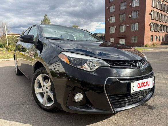 2014 Toyota Corolla XI (E160, E170, E180), чёрный, 1319000 рублей - вид 1