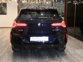 2026 BMW X3 Long 30L xDrive IV (G45/G48), чёрный, 7130000 рублей, вид 4
