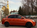 2010 Kia Rio II Рестайлинг, оранжевый, 495000 рублей - вид 3