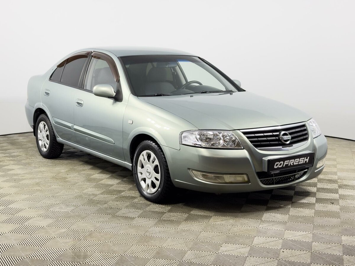 Открыть фотографии: Nissan Almera Classic I