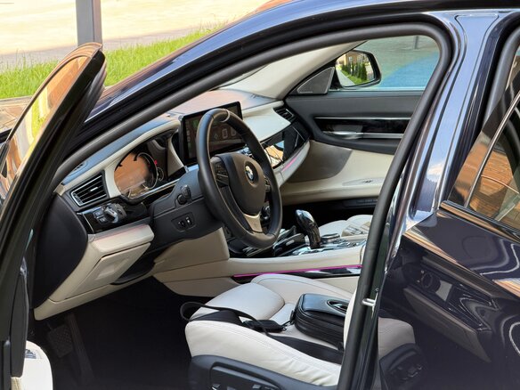 2012 BMW 7 серии Long 740Li xDrive V (F01/F02/F04) Рестайлинг, синий, 1900000 рублей - вид 28