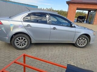 2012 Mitsubishi Lancer X Рестайлинг, серебристый, 760000 рублей, вид 3