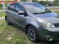 2012 Nissan Note I Рестайлинг, серый - вид 1