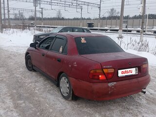 1997 Mitsubishi Carisma I, пурпурный, 180000 рублей, вид 4