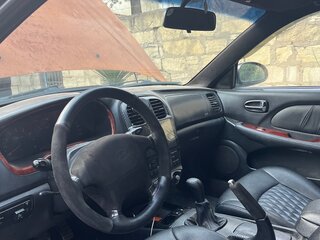 2007 Hyundai Sonata ТагАЗ IV (EF) Рестайлинг, чёрный, 370000 рублей, вид 3