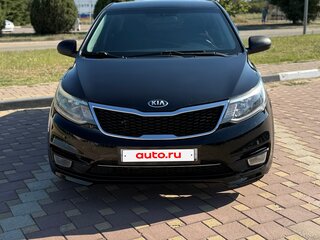 2015 Kia Rio III Рестайлинг, чёрный, 670000 рублей, вид 2