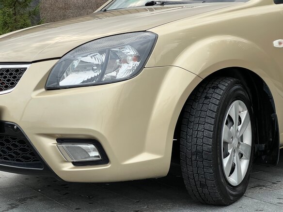 2011 Kia Rio II Рестайлинг, бежевый - вид 6