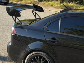 2010 Mitsubishi Lancer X, чёрный, 690000 рублей, вид 3