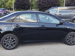 2008 Toyota Corolla X (E140, E150), чёрный, 670000 рублей, вид 3