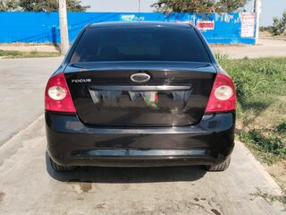2010 Ford Focus II Рестайлинг, чёрный, 450000 рублей, вид 4