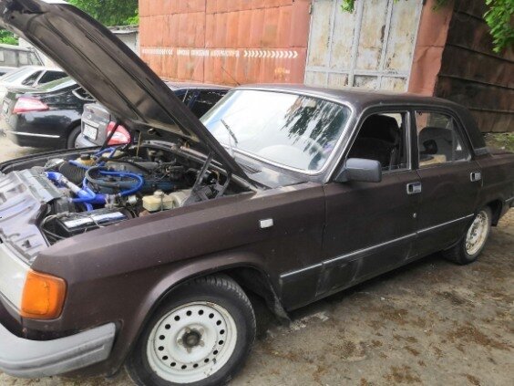 1999 ГАЗ 3110 «Волга», коричневый, 140000 рублей