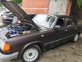 1999 ГАЗ 3110 «Волга», коричневый, 140000 рублей