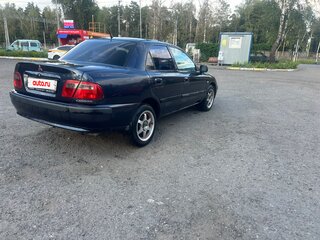 2001 Mitsubishi Carisma I Рестайлинг, синий, 190000 рублей, вид 4