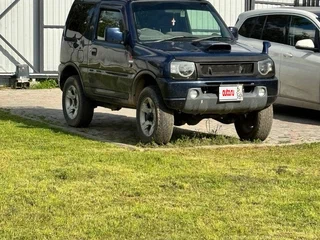 2009 Suzuki Jimny Kei car III Рестайлинг 1, синий, 750000 рублей, вид 1