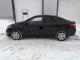 2012 Kia Rio 5-speed III, чёрный, 900000 рублей, вид 5