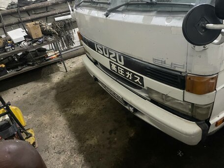 1991 Isuzu Elf (N-series), белый, 1900000 рублей, вид 4