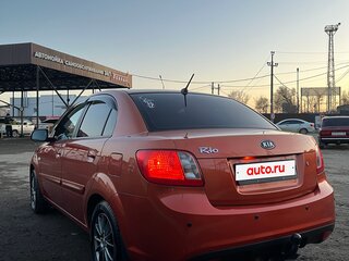 2010 Kia Rio II Рестайлинг, оранжевый, 650000 рублей, вид 1