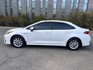 2022 Toyota Corolla Sporty XII (E210), белый, 1640000 рублей, вид 4
