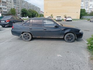 2010 Daewoo Nexia I Рестайлинг, чёрный, 100000 рублей, вид 2