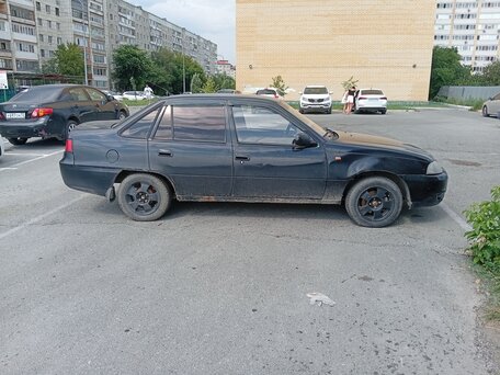 2010 Daewoo Nexia I Рестайлинг, чёрный, 100000 рублей, вид 2