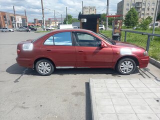 2001 Nissan Sunny N16, красный, 250000 рублей, вид 2