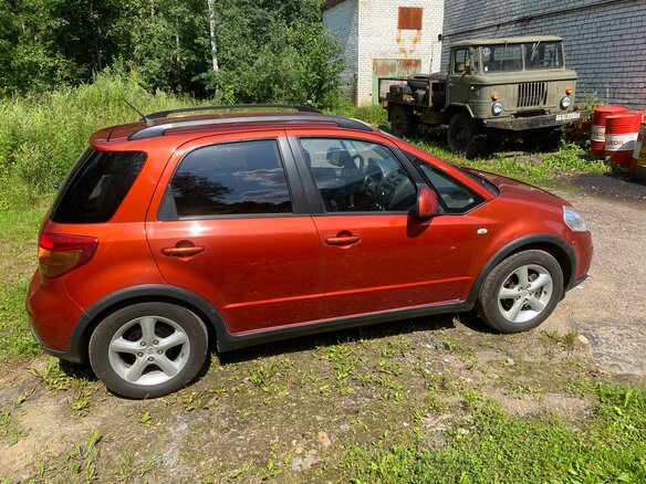 2008 Suzuki SX4 I (Classic), красный - вид 3
