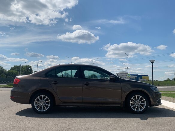 2012 Volkswagen Jetta VI, коричневый, 679000 рублей - вид 3