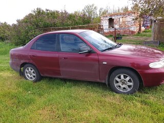 1999 Daewoo Nubira I, пурпурный, 250000 рублей, вид 4