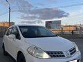 2010 Nissan Tiida I Рестайлинг, белый, 570000 рублей - вид 1