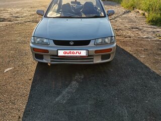 1995 Mazda Familia VII (BH), золотистый, 155000 рублей, вид 1