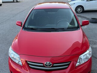 2008 Toyota Corolla AMT X (E140, E150), красный, 790000 рублей, вид 2