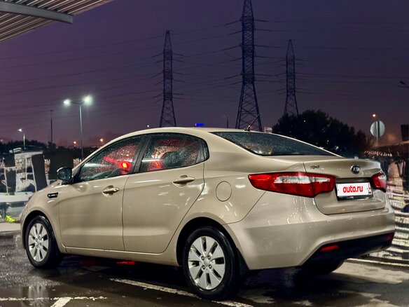 2012 Kia Rio 4-speed III, бежевый - вид 6