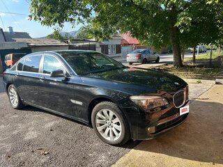 2010 BMW 7 серии Long 750Li xDrive V (F01/F02/F04), чёрный, 1000000 рублей, вид 1
