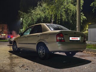2000 Mazda Familia VIII (BJ), золотистый, 250000 рублей, вид 2