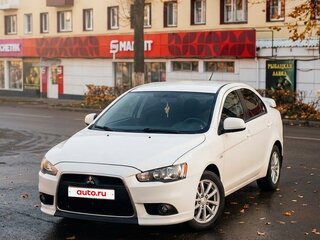 2011 Mitsubishi Lancer X Рестайлинг, белый, 620000 рублей, вид 2