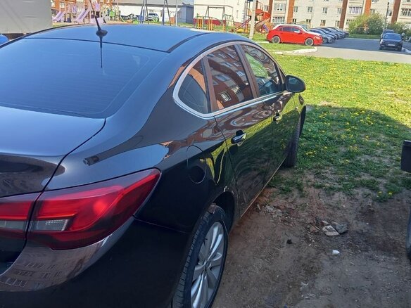 2013 Opel Astra J Рестайлинг, коричневый, 670000 рублей - вид 4