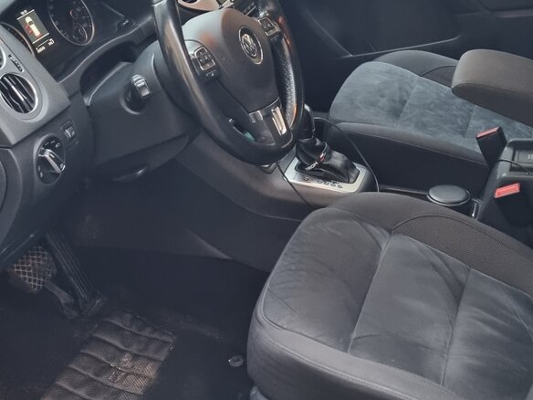 2014 Volkswagen Tiguan I Рестайлинг, чёрный, 1500000 рублей - вид 8