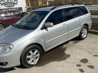 2006 Toyota Corolla IX (E120, E130) Рестайлинг, серебристый, 700000 рублей, вид 2