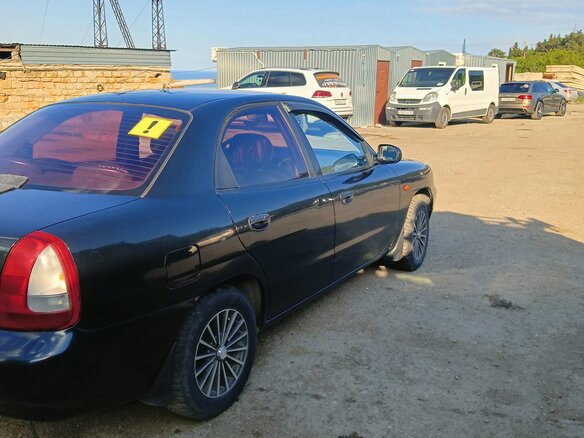 1999 Daewoo Nubira I, чёрный, 300000 рублей - вид 9