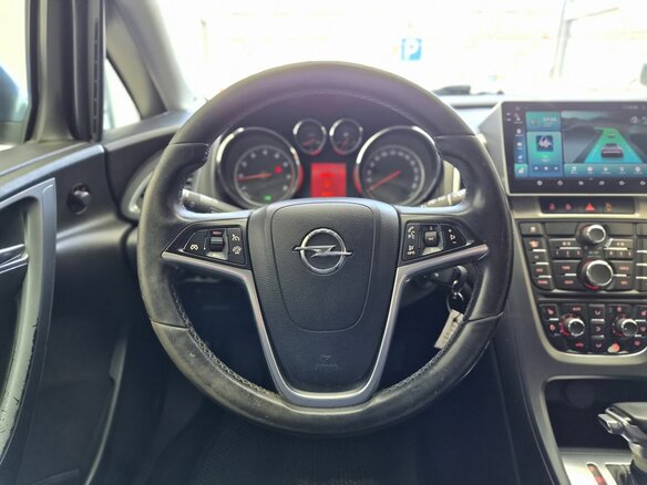 2012 Opel Astra J Рестайлинг, синий - вид 8