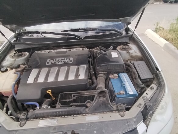 2010 Chevrolet Epica V250 Рестайлинг, серебристый, 420000 рублей - вид 9