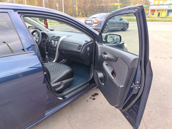 2009 Toyota Corolla X (E140, E150), синий, 650000 рублей - вид 8