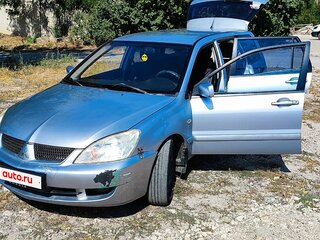 2006 Mitsubishi Lancer IX Рестайлинг, серебристый, 300000 рублей, вид 2