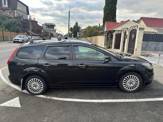 2010 Ford Focus II Рестайлинг, чёрный, 560000 рублей, вид 2