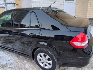 2011 Nissan Tiida I Рестайлинг, чёрный, 710000 рублей, вид 2