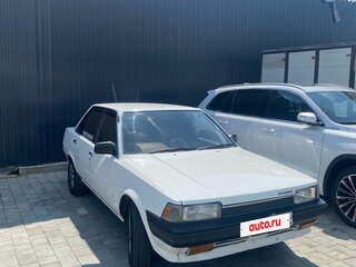 1987 Toyota Carina 4-speed IV (T150), белый, 250000 рублей, вид 1